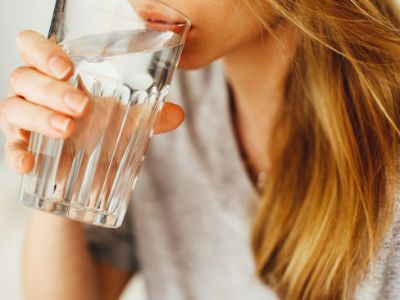 woman having a glass of water